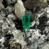 Beryl (variety emerald), Calcite, Pyrite<br />La Pita mining district, Municipio Maripí, Western Emerald Belt, Boyacá Department, Colombia<br />54x36x60mm, xl=8mm<br /> (Author: Fiebre Verde)