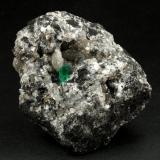 Beryl (variety emerald), Calcite, Pyrite<br />La Pita mining district, Municipio Maripí, Western Emerald Belt, Boyacá Department, Colombia<br />54x36x60mm, xl=8mm<br /> (Author: Fiebre Verde)