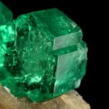 Beryl (variety emerald), Calcite<br />Muzo mining district, Western Emerald Belt, Boyacá Department, Colombia<br />60x47x49mm, central xl=16mm<br /> (Author: Fiebre Verde)