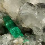 Beryl (variety emerald), Calcite<br />La Pita mining district, Polveros Mine, Municipio Maripí, Western Emerald Belt, Boyacá Department, Colombia<br />110x85x85mm, xl=30mm<br /> (Author: Fiebre Verde)