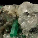 Beryl (variety emerald), Calcite<br />La Pita mining district, Polveros Mine, Municipio Maripí, Western Emerald Belt, Boyacá Department, Colombia<br />110x85x85mm, xl=30mm<br /> (Author: Fiebre Verde)