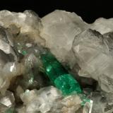 Beryl (variety emerald), Calcite<br />La Pita mining district, Polveros Mine, Municipio Maripí, Western Emerald Belt, Boyacá Department, Colombia<br />110x85x85mm, xl=30mm<br /> (Author: Fiebre Verde)