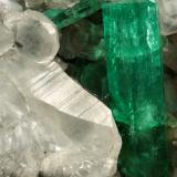 Beryl (variety emerald), Calcite<br />La Pita mining district, Polveros Mine, Municipio Maripí, Western Emerald Belt, Boyacá Department, Colombia<br />110x85x85mm, xl=30mm<br /> (Author: Fiebre Verde)