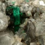 Beryl (variety emerald), Calcite<br />La Pita mining district, Polveros Mine, Municipio Maripí, Western Emerald Belt, Boyacá Department, Colombia<br />110x85x85mm, xl=30mm<br /> (Author: Fiebre Verde)