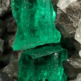 Beryl (variety emerald), Calcite<br />La Pita mining district, Municipio Maripí, Western Emerald Belt, Boyacá Department, Colombia<br />60x55x80mm, xl=6+8mm<br /> (Author: Fiebre Verde)