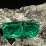 Beryl (variety emerald), Calcite<br />La Pita mining district, Municipio Maripí, Western Emerald Belt, Boyacá Department, Colombia<br />60x55x80mm, xl=6+8mm<br /> (Author: Fiebre Verde)