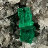 Beryl (variety emerald), Calcite<br />La Pita mining district, Municipio Maripí, Western Emerald Belt, Boyacá Department, Colombia<br />60x55x80mm, xl=6+8mm<br /> (Author: Fiebre Verde)