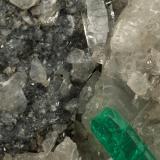 Beryl (variety emerald), Calcite, Pyrite, Quartz<br />Muzo mining district, Western Emerald Belt, Boyacá Department, Colombia<br />105x65x60mm, xl=24mm<br /> (Author: Fiebre Verde)