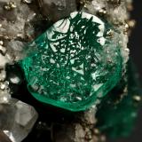 Beryl (variety emerald), Calcite, Pyrite, Albite (variety cleavelandite)<br />Chivor mining district, Municipio Chivor, Eastern Emerald Belt, Boyacá Department, Colombia<br />70x46x34mm, main xl=18mm<br /> (Author: Fiebre Verde)