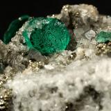 Beryl (variety emerald), Calcite, Pyrite, Albite (variety cleavelandite)<br />Chivor mining district, Municipio Chivor, Eastern Emerald Belt, Boyacá Department, Colombia<br />70x46x34mm, main xl=18mm<br /> (Author: Fiebre Verde)