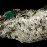 Beryl (variety emerald), Calcite, Pyrite, Albite (variety cleavelandite)<br />Chivor mining district, Municipio Chivor, Eastern Emerald Belt, Boyacá Department, Colombia<br />70x46x34mm, main xl=18mm<br /> (Author: Fiebre Verde)