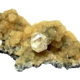 Calcite on stilbite<br />Sokolovskoe Mine (Sokolovskiy Mine), Rudny, Kostanay Region, Kazakhstan<br />Central crystal 12 mm, specimen size 8 cm<br /> (Author: Tobi)