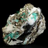 Beryl (variety emerald), Calcite, Pyrite<br />Chivor mining district, Municipio Chivor, Eastern Emerald Belt, Boyacá Department, Colombia<br />102x36x87mm, xl=13mm<br /> (Author: Fiebre Verde)