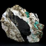 Beryl (variety emerald), Calcite, Pyrite<br />Chivor mining district, Municipio Chivor, Eastern Emerald Belt, Boyacá Department, Colombia<br />102x36x87mm, xl=13mm<br /> (Author: Fiebre Verde)