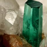 Beryl (variety emerald), Calcite, Parisite<br />La Pita mining district, Municipio Maripí, Western Emerald Belt, Boyacá Department, Colombia<br />8x8x8cm, H35mm, xl=8mm<br /> (Author: Fiebre Verde)