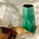 Beryl (variety emerald), Calcite, Parisite<br />La Pita mining district, Municipio Maripí, Western Emerald Belt, Boyacá Department, Colombia<br />8x8x8cm, H35mm, xl=8mm<br /> (Author: Fiebre Verde)