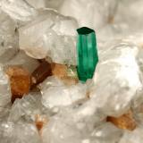 Beryl (variety emerald), Calcite, Parisite<br />La Pita mining district, Municipio Maripí, Western Emerald Belt, Boyacá Department, Colombia<br />8x8x8cm, H35mm, xl=8mm<br /> (Author: Fiebre Verde)