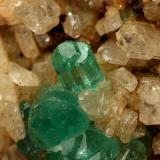 Beryl (variety emerald), Albite (variety cleavelandite)<br />Chivor mining district, Municipio Chivor, Eastern Emerald Belt, Boyacá Department, Colombia<br />64x39x53mm, main xl=23mm<br /> (Author: Fiebre Verde)