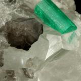 Beryl (variety emerald), Calcite<br />Coscuez mining district, Municipio San Pablo de Borbur, Western Emerald Belt, Boyacá Department, Colombia<br />54x34x50mm, both xls=13mm<br /> (Author: Fiebre Verde)