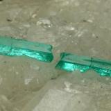 Beryl (variety emerald), Calcite<br />La Pita mining district, Polveros Mine, Municipio Maripí, Western Emerald Belt, Boyacá Department, Colombia<br />75x44x39mm, xl=22mm (combined size)<br /> (Author: Fiebre Verde)