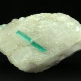 Beryl (variety emerald), Calcite<br />La Pita mining district, Polveros Mine, Municipio Maripí, Western Emerald Belt, Boyacá Department, Colombia<br />75x44x39mm, xl=22mm (combined size)<br /> (Author: Fiebre Verde)