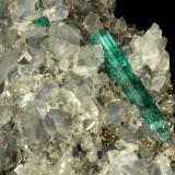 Beryl (variety emerald), Calcite, Pyrite, Dolomite<br />Chivor mining district, Municipio Chivor, Eastern Emerald Belt, Boyacá Department, Colombia<br />98x70x38mm, xl=31mm<br /> (Author: Fiebre Verde)