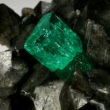 Beryl (variety emerald), Calcite<br />Coscuez mining district, Municipio San Pablo de Borbur, Western Emerald Belt, Boyacá Department, Colombia<br />68x62x40mm, xl=15mm<br /> (Author: Fiebre Verde)