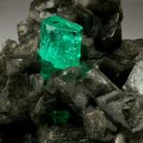 Beryl (variety emerald), Calcite<br />Coscuez mining district, Municipio San Pablo de Borbur, Western Emerald Belt, Boyacá Department, Colombia<br />68x62x40mm, xl=15mm<br /> (Author: Fiebre Verde)