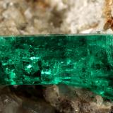 Beryl (variety emerald), Calcite, Pyrite, Albite (variety cleavelandite)<br />Chivor mining district, Municipio Chivor, Eastern Emerald Belt, Boyacá Department, Colombia<br />22x21x30mm, xl=14mm<br /> (Author: Fiebre Verde)