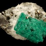 Beryl (variety emerald), Calcite, Pyrite<br />Chivor mining district, Municipio Chivor, Eastern Emerald Belt, Boyacá Department, Colombia<br />29x18x39mm, xl=24mm<br /> (Author: Fiebre Verde)