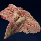 Rhodonite with Tremolite<br />Chaobuleng Mine, East Ujimqin Banner (Dongwu Qi), Xilin Gol League (Xilinguole Prefecture), Inner Mongolia Autonomous Region, China<br />130 x 68 x 58 mm<br /> (Author: GneissWare)