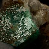 Beryl (variety emerald), Calcite<br />La Pita mining district, Polveros Mine, Municipio Maripí, Western Emerald Belt, Boyacá Department, Colombia<br />32x25x32mm, xl=25mm<br /> (Author: Fiebre Verde)