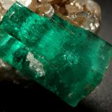 Beryl (variety emerald), Calcite<br />La Pita mining district, Polveros Mine, Municipio Maripí, Western Emerald Belt, Boyacá Department, Colombia<br />32x25x32mm, xl=25mm<br /> (Author: Fiebre Verde)