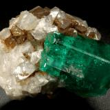 Beryl (variety emerald), Calcite<br />La Pita mining district, Polveros Mine, Municipio Maripí, Western Emerald Belt, Boyacá Department, Colombia<br />32x25x32mm, xl=25mm<br /> (Author: Fiebre Verde)