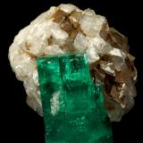 Beryl (variety emerald), Calcite<br />La Pita mining district, Polveros Mine, Municipio Maripí, Western Emerald Belt, Boyacá Department, Colombia<br />32x25x32mm, xl=25mm<br /> (Author: Fiebre Verde)