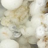 Chabazite-Na Horvathite-(Y)<br />Poudrette Quarry, Mont Saint-Hilaire, La Vallée-du-Richelieu RCM, Montérégie, Québec, Canada<br />FOV = 4mm<br /> (Author: Doug)