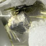 Cerussite  Wulfenite  Galena  Aegirine<br />Poudrette Quarry, Mont Saint-Hilaire, La Vallée-du-Richelieu RCM, Montérégie, Québec, Canada<br />FOV = 2mm<br /> (Author: Doug)