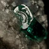 Beryl (variety emerald), Calcite, Dolomite<br />Muzo mining district, Western Emerald Belt, Boyacá Department, Colombia<br />triangle side=35mm, xl=11mm<br /> (Author: Fiebre Verde)