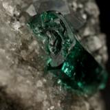 Beryl (variety emerald), Calcite, Dolomite<br />Muzo mining district, Western Emerald Belt, Boyacá Department, Colombia<br />triangle side=35mm, xl=11mm<br /> (Author: Fiebre Verde)