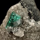 Beryl (variety emerald), Calcite, Dolomite<br />Muzo mining district, Western Emerald Belt, Boyacá Department, Colombia<br />triangle side=35mm, xl=11mm<br /> (Author: Fiebre Verde)