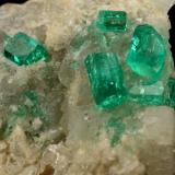 Beryl (variety emerald), Calcite, Dolomite<br />La Pita mining district, Cunas Mine, Municipio Maripí, Western Emerald Belt, Boyacá Department, Colombia<br />42x39x34mm, xls up to 7mm<br /> (Author: Fiebre Verde)