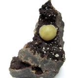 Calcite<br />Basalt Quarry, Malscheid, Herdorf, Siegerland, Rhineland-Palatinate/Rheinland-Pfalz, Germany<br />Specimen height 7,5 cm, calcite measures 1,5 cm<br /> (Author: Tobi)