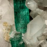 Beryl (variety emerald), Calcite<br />Muzo mining district, Western Emerald Belt, Boyacá Department, Colombia<br />130x85x100mm, xls up to 27mm<br /> (Author: Fiebre Verde)