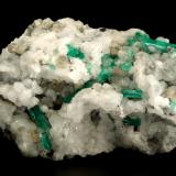 Beryl (variety emerald), Calcite<br />Muzo mining district, Western Emerald Belt, Boyacá Department, Colombia<br />130x85x100mm, xls up to 27mm<br /> (Author: Fiebre Verde)