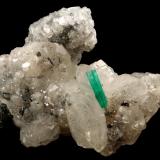 Beryl (variety emerald), Calcite<br />La Pita mining district, Polveros Mine, Municipio Maripí, Western Emerald Belt, Boyacá Department, Colombia<br />35x64x49mm, xl=12mm<br /> (Author: Fiebre Verde)