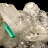 Beryl (variety emerald), Calcite<br />La Pita mining district, Polveros Mine, Municipio Maripí, Western Emerald Belt, Boyacá Department, Colombia<br />35x64x49mm, xl=12mm<br /> (Author: Fiebre Verde)