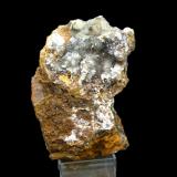 Calcita sobre limonitaMina Trinidad, Cerros del Romeral y Pechón, Benalmádena-Mijas, Comarca Costa del Sol Occidental, Málaga, Andalucía, España75mm - 64mm - 111mm (Autor: Pedro Naranjo)