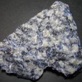 Sienita nefelínica con sodalita
Bahia, Brasil
7&rsquo;5 x 6&rsquo;5 cm.
Es la roca llamada "granito azul bahía".  Ver el magnífico hilo "Las rocas ornamentales en Brasil": http://www.foro-minerales.com/forum/viewtopic.php?p=33796#33796 . (Autor: prcantos)