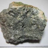 Microgabro (dolerita)
Mynydd Preseli (Preseli Hills), Pembrokeshire, Gales, Reino Unido
6 x 4 cm.
Otra cara de la misma roca, con granos blancos menores y evidente color verde-azulado. (Autor: prcantos)