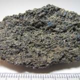 Tefrifonolita con haüyna
Punta Camello, Arucas, Gran Canaria, Islas Canarias, España
4&rsquo;5 x 2&rsquo;8 cm.
Una lava ligeramente porosa salpicada por los pequeños cristales azules de haüyina. (Autor: prcantos)